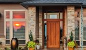 The days when houses were designed around the front entry are gone, but could return.